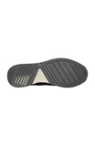 black athletic shoe sole bottom view