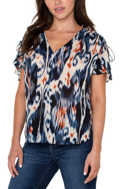 Open SHIRRED V-NECK TOP WITH TIE DETAILS ALLOVER IKAT-1 in gallery view