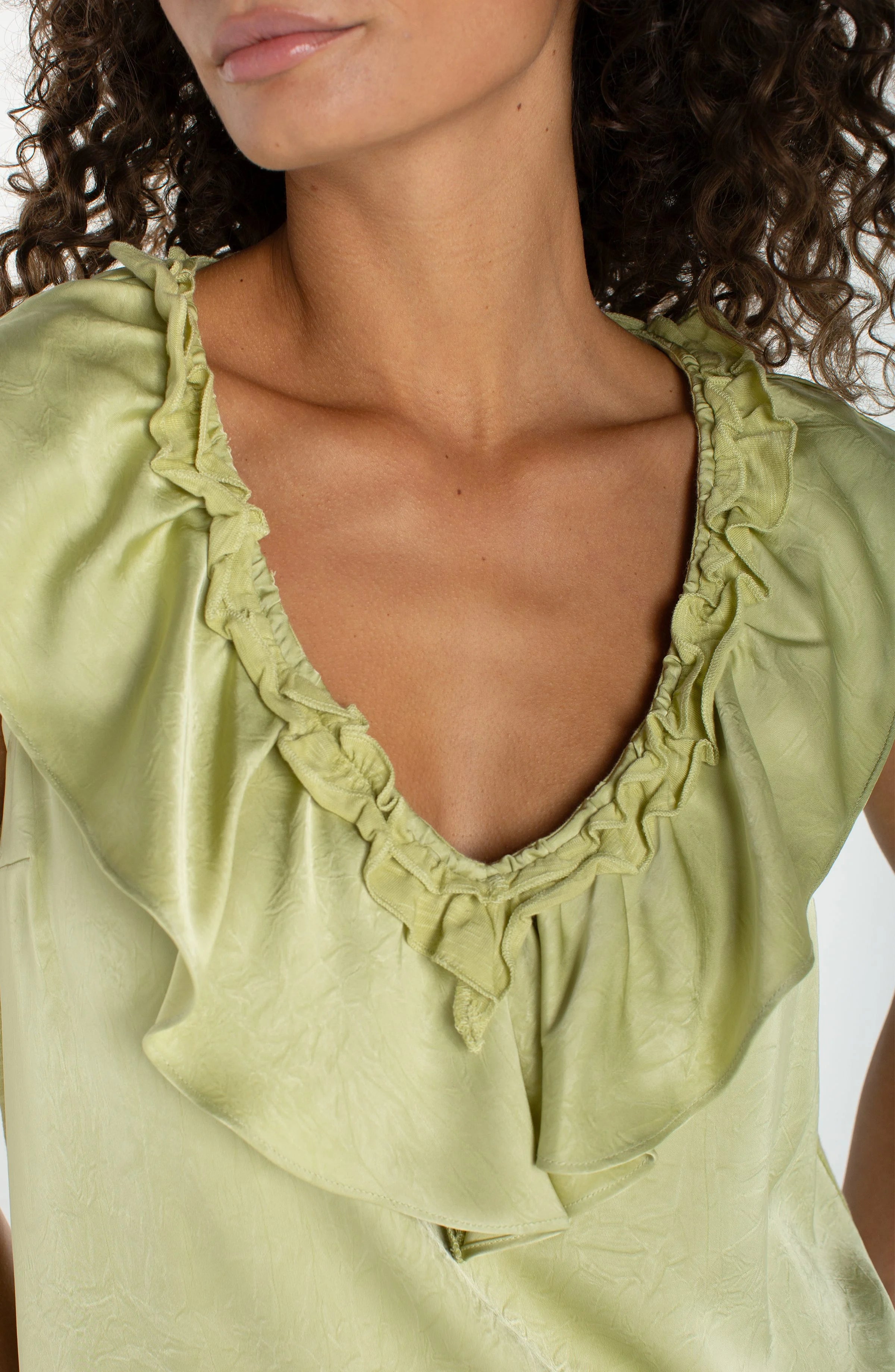 RUFFLE FRONT SLEEVELESS WOVEN-TO-KNIT TOP